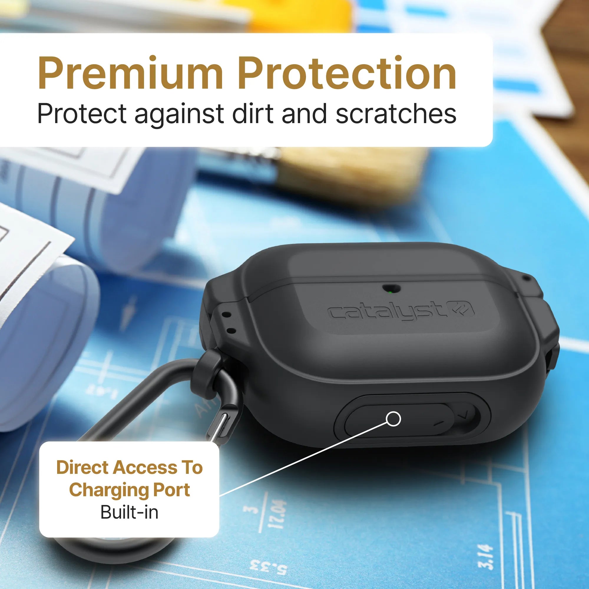 A black Catalyst Case US AirPods Pro (Gen 2/1) 100M Waterproof Total Protection Case + Carabiner is shown on blueprints beside a paintbrush. Text reads "Premium Protectionâ€â€ÂProtect against dirt and scratches." Label: "Direct Access To Charging Port.