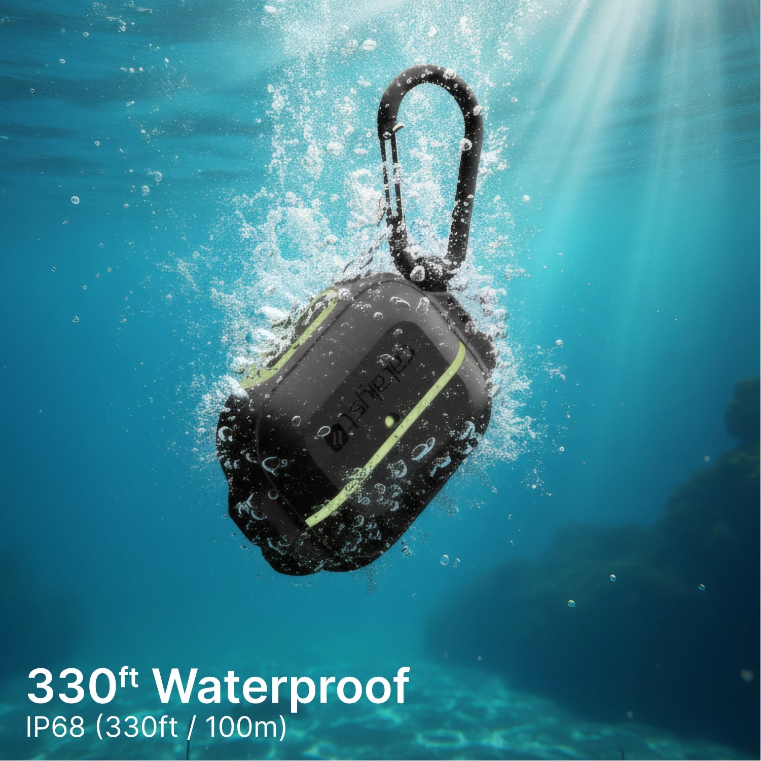 The Catalyst Case US AirPods Pro (Gen 2/1) - 100M Waterproof Total Protection Case + Carabiner, with a green stripe, withstands drops underwater to 330ft (IP68), as bubbles rise and sunlight filters through blue depths and rocky terrain.