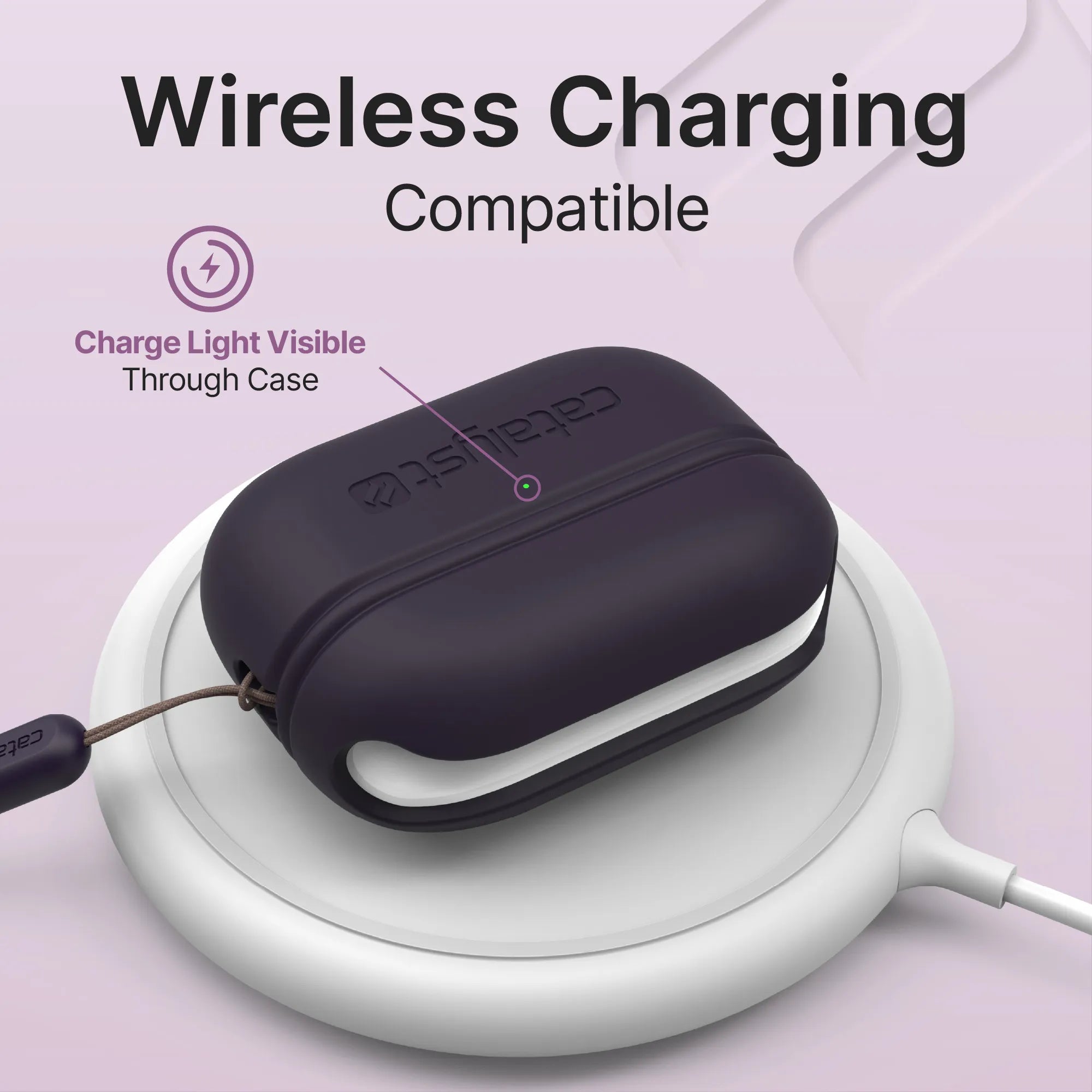 A dark purple Catalyst Case US AirPods Pro (Gen 2) Essential Case + Lanyard with a visible charge light rests on a white wireless charging pad. Text above: “Wireless Charging Compatible†and “Charge Light Visible Through Case.â€.
