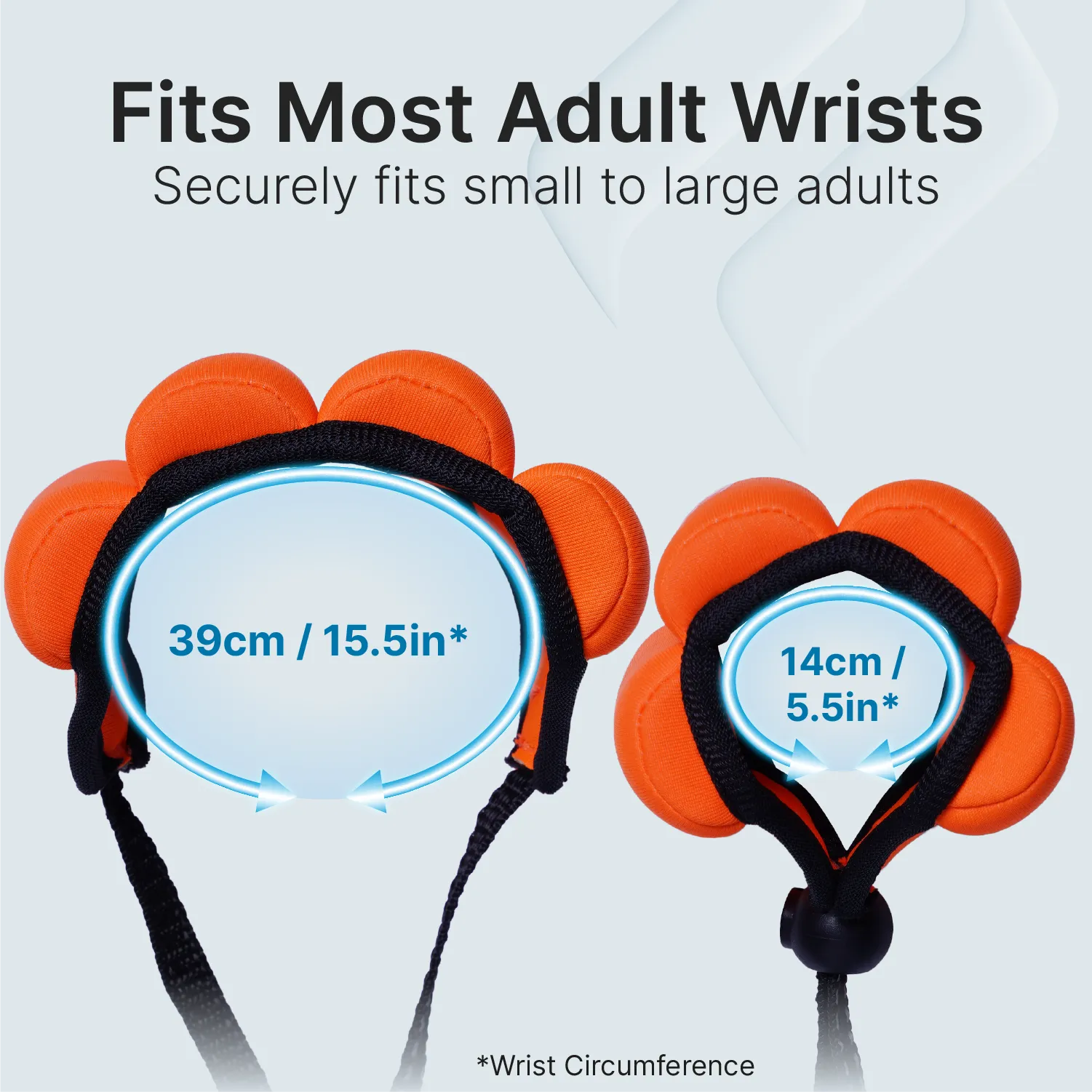 Two orange Catalyst Case US Floating Wrist Lanyards, shaped like animal paws, are shown: one large (39cm/15.5in) and one small (14cm/5.5in). Text above reads, “Fits Most Adult Wristsâ€â€ÂSecurely fits small to large adults.â€ÂÂ.