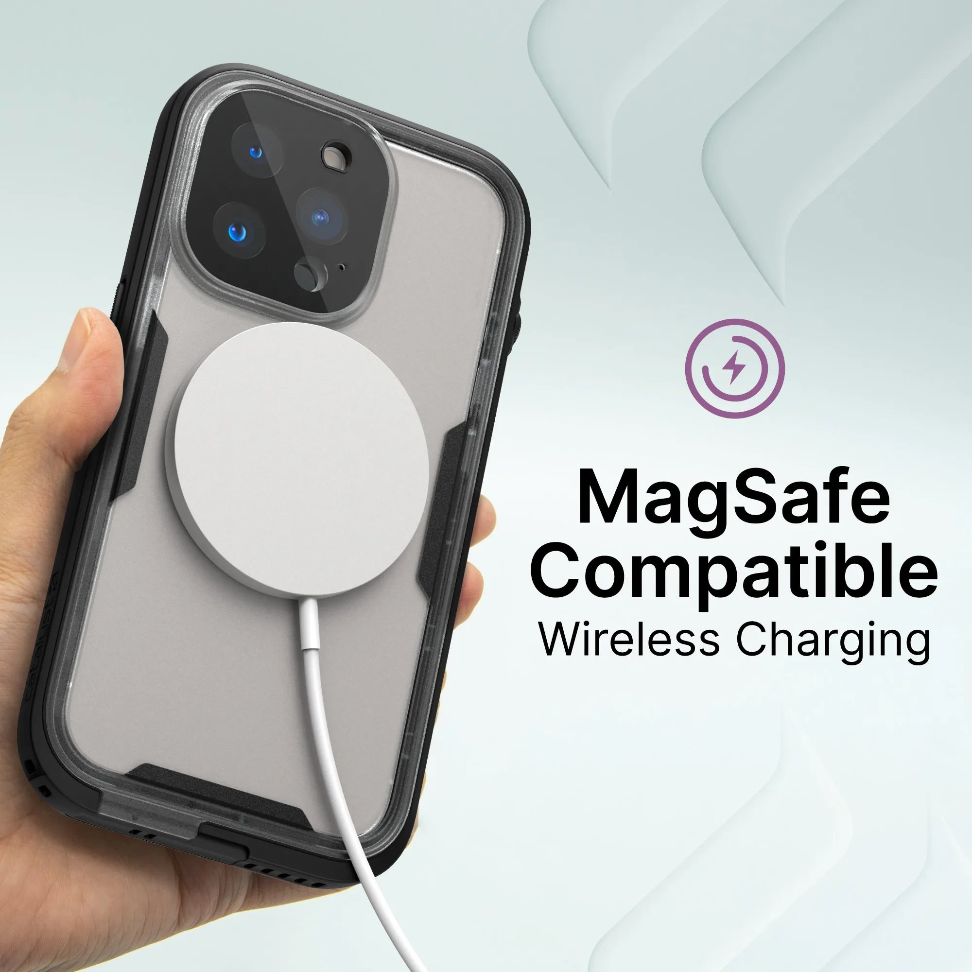 A hand holds an iPhone 13 Pro Max in a black Catalyst Case US waterproof case, with a white MagSafe charger attached. “MagSafe Compatible Wireless Charging” appears in text with a purple charging bolt icon and pale geometric shapes in the background.