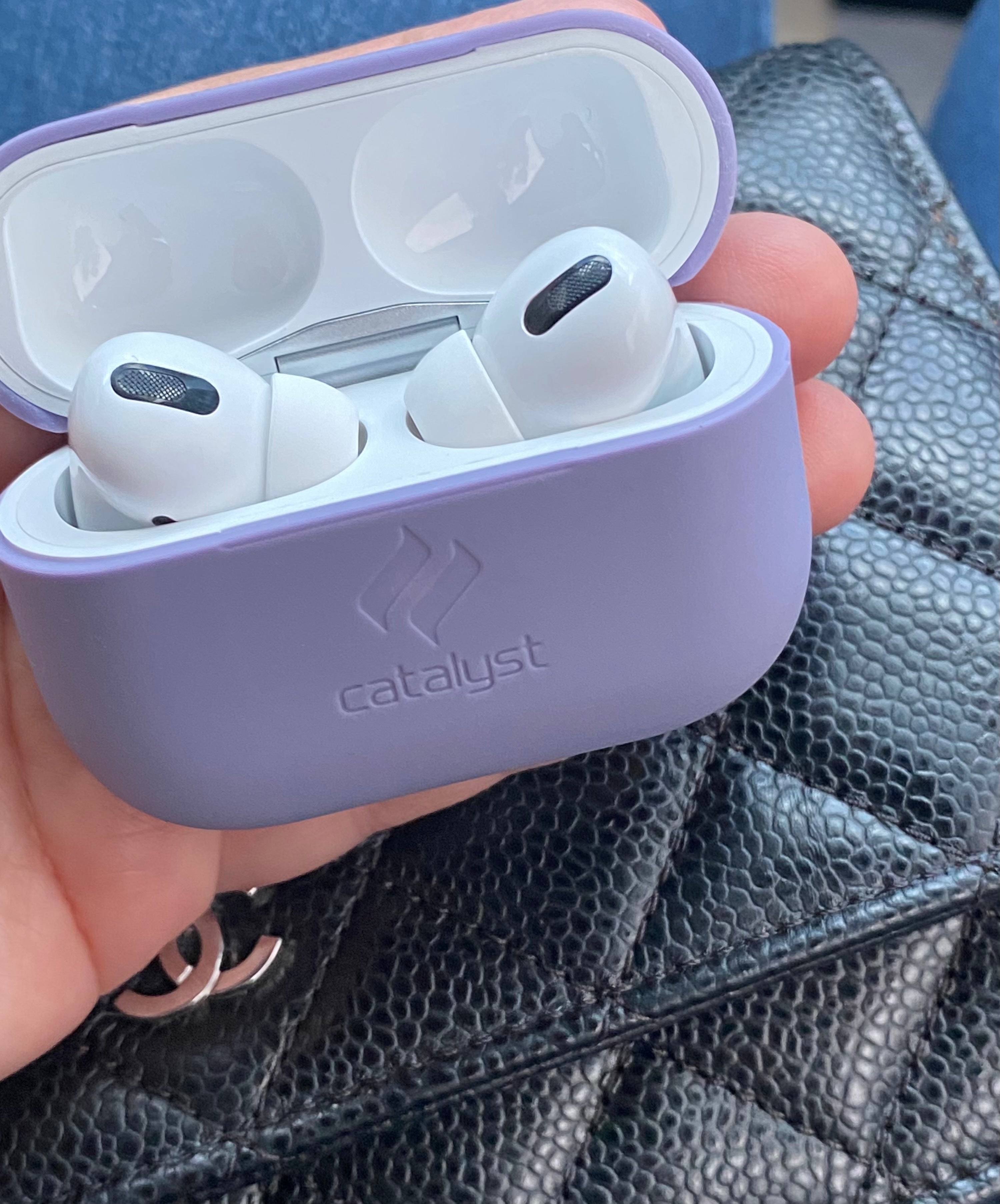 Catalyst airpods pro gen 2/1 slim case showing airpods inside-the case in lilac colorway