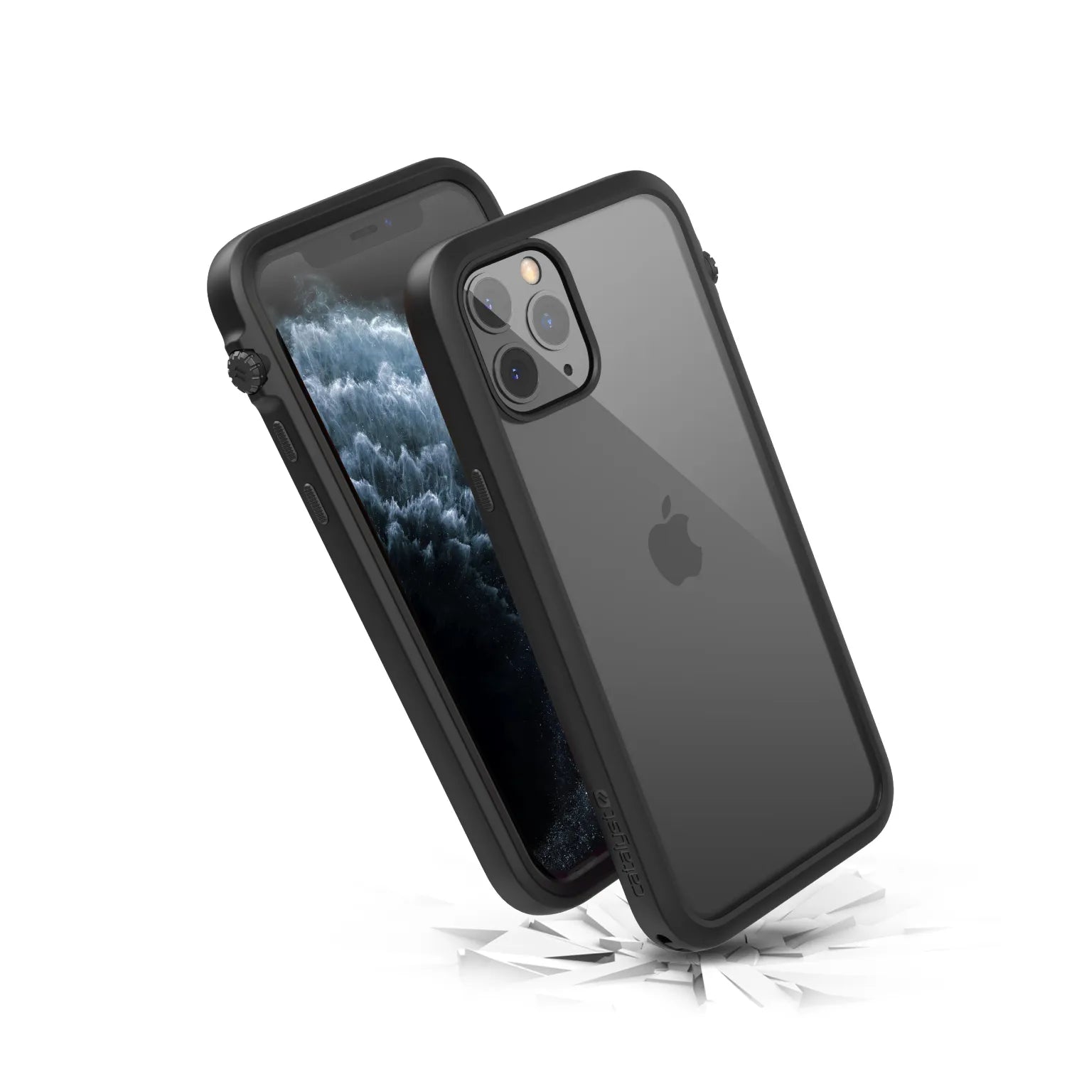 Two iPhone 11 Pros in black Catalyst Case US Impact Protection Cases are shownâ€â€Âone displays the screen, the other the Apple logo and triple cameraâ€â€Âbouncing off shattered white surface, highlighting MIL-STD 810G drop-proof protection.