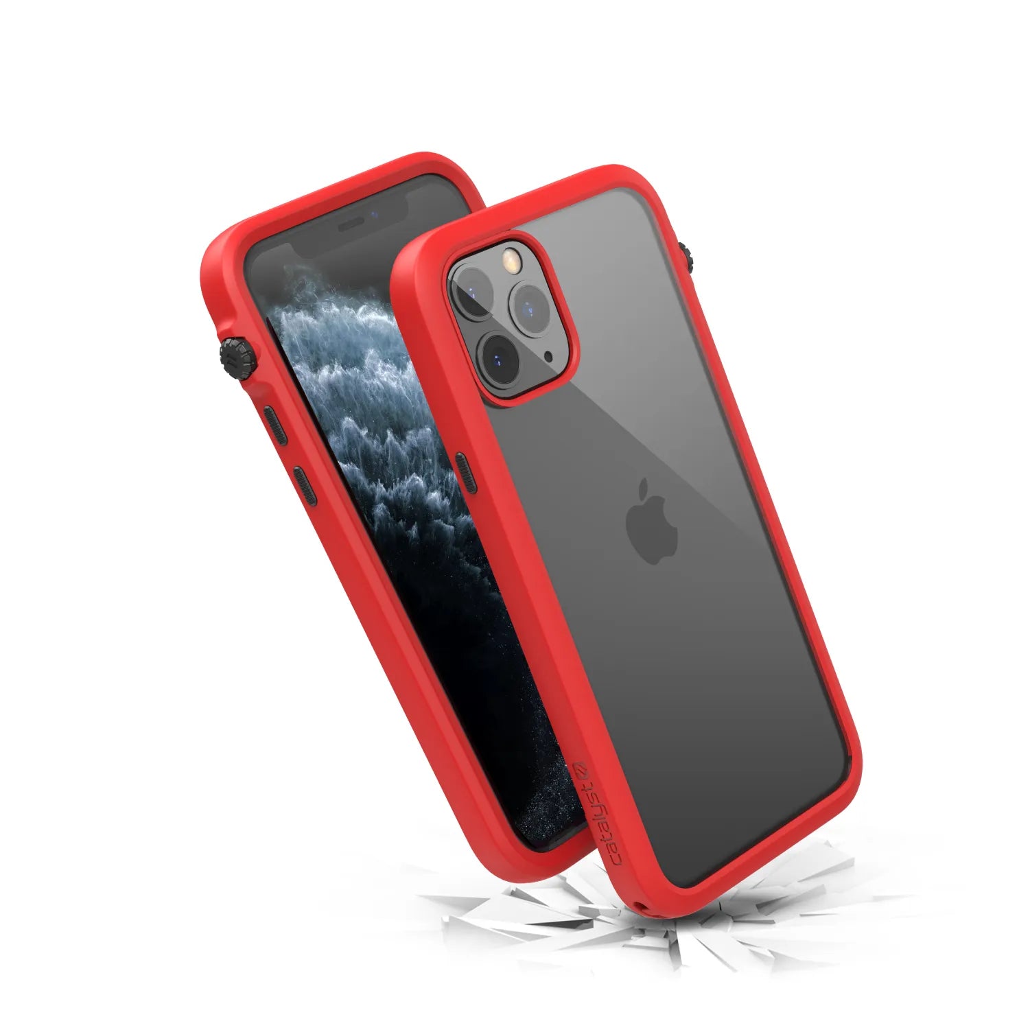 Two iPhone 11 Pros in Catalyst Case US Impact Protection Cases with clear backs and red bumpers are shownâ€â€Âone displaying the screen, the other the Apple logo and triple camera. MIL-STD 810G-rated for durability, they rest above cracked shards to show impact resistance.