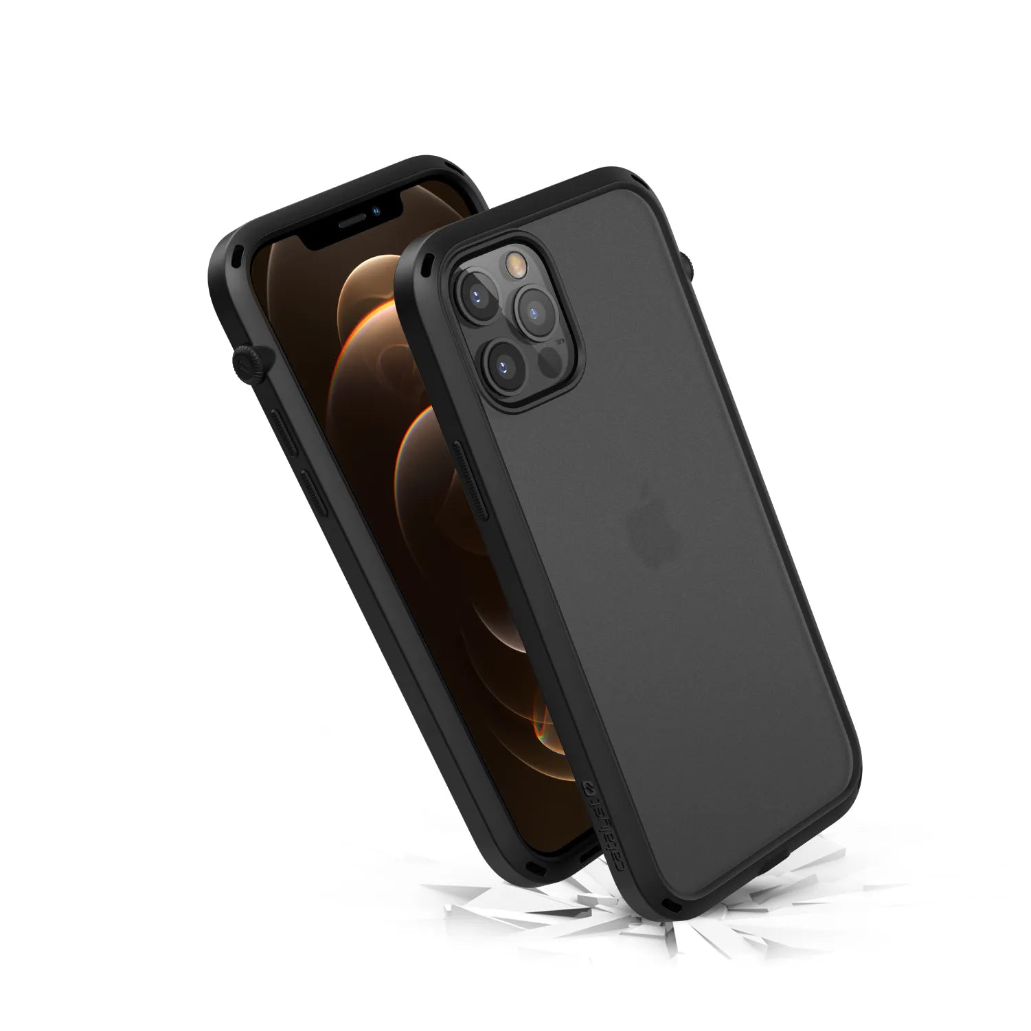Two Catalyst Case US iPhone 12 / 12 Pro Influence cases in black—one showing the screen, the other revealing its triple-camera back—float above shattered white fragments, highlighting their MIL-STD 810G drop-proof protection against a plain white background.