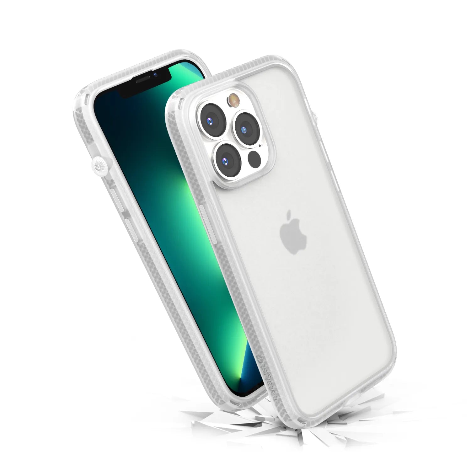 The Catalyst Case US Influence Case in Clear for iPhone 13 Pro is shown upright with the screen on and a green gradient display. The phone appears to be dropping onto a white surface, highlighting the case’s Drop Proof protection as shards scatter below.
