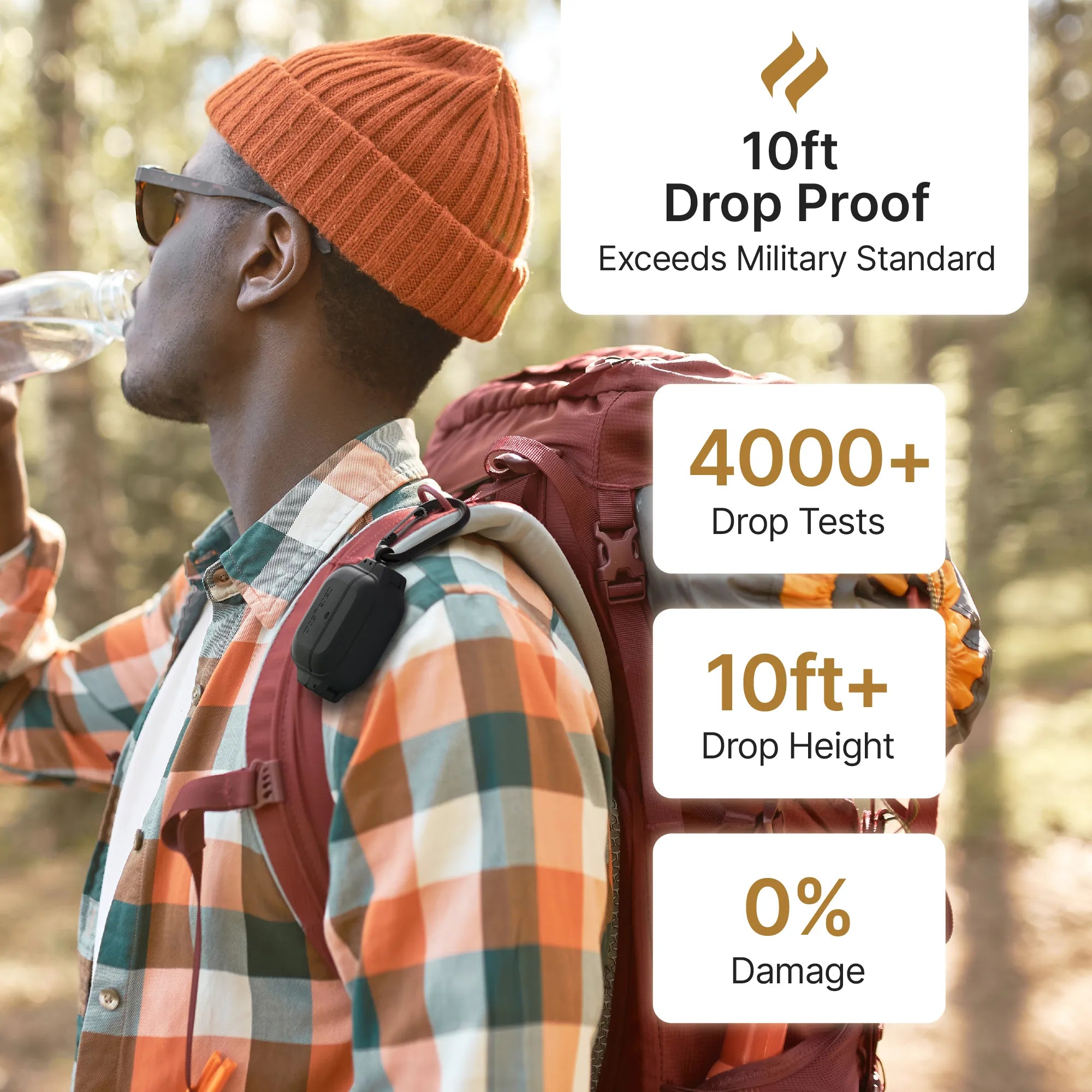 A man hikes in a forest, wearing sunglasses, an orange beanie, and a plaid shirt. He carries a red backpack with a Catalyst Case US AirPods (Gen 3) case—waterproof to 330ft and drop proof, tested over 4000 times for 0% damage at 10ft+.