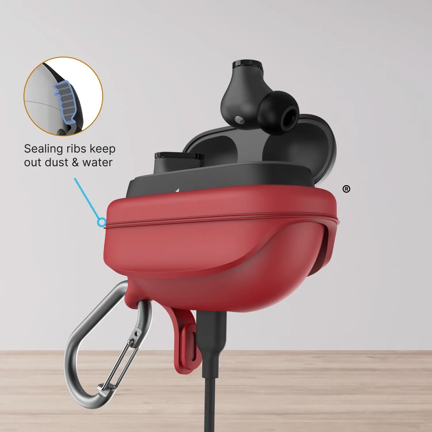 The Catalyst Case US Waterproof Case + Carabiner for Beats Studio Buds / Studio Buds Plus is shown open on wood, revealing black earbuds. A close-up highlights sealing ribs for dust and water protection; a charging cable connects at the bottom.
