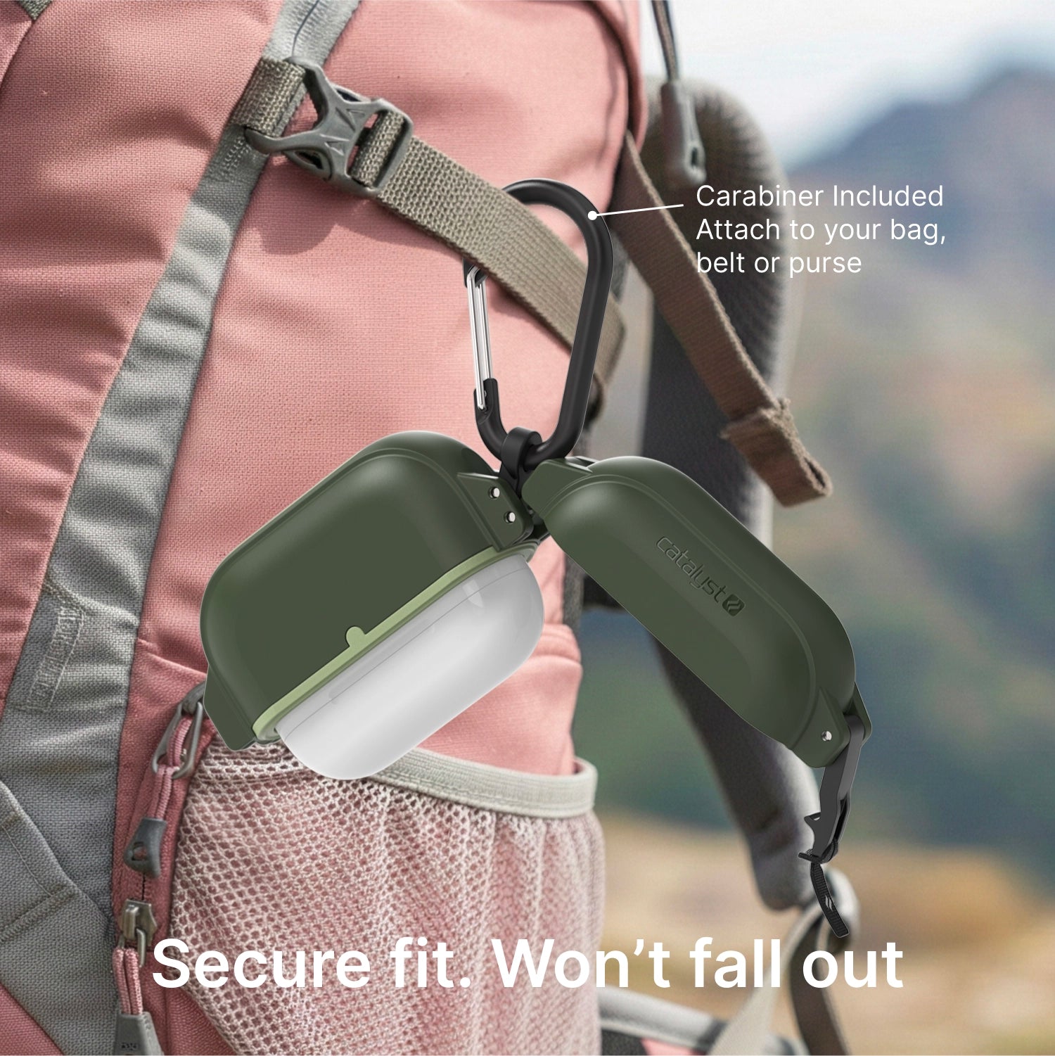 A green Catalyst Case US AirPods Pro 3 - 100M Waterproof Total Protection Case + Carabiner hangs from a backpack strap. Text: "Carabiner Included. Attach to your bag, belt or purse" and "Secure fit. Won’t fall out." Blurred mountain behind.