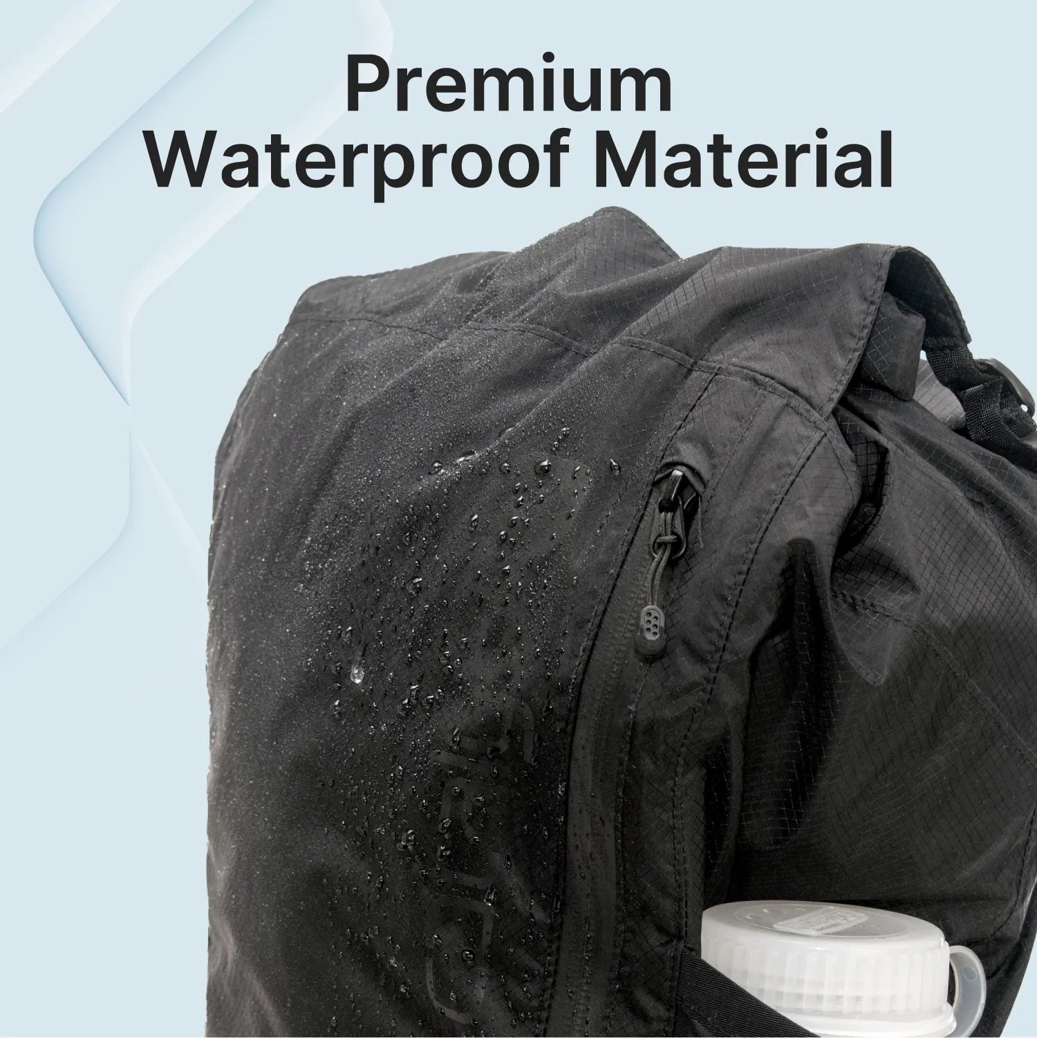 A close-up of the Catalyst Case US Waterproof 20L Backpack shows water droplets on its surface, highlighting its waterproof material. A zipper and a white bottle in the side pocket are visible against a light blue background with “Premium Waterproof Material.”.