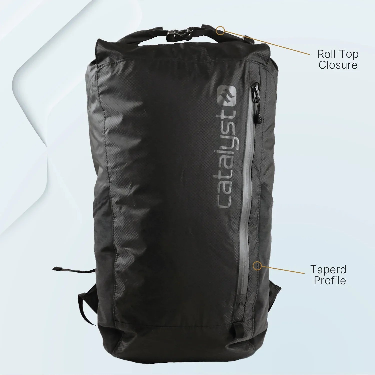The Catalyst Case US Waterproof 20L Backpack is black with a roll-top closure, a diagonal front zipper, and "catalyst" printed vertically. Labels highlight the “Roll Top Closure” at the top and “Tapered Profile” at the bottom on a minimal light background.